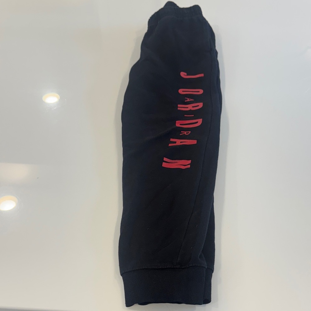 Nike Air Jordan Kids Black Sweatpants with Red Vertical Logo size L